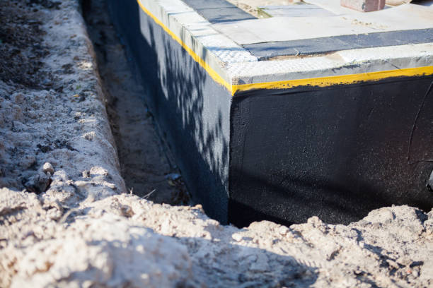 Professional Basement Waterproofing technician working in Whiting, IN